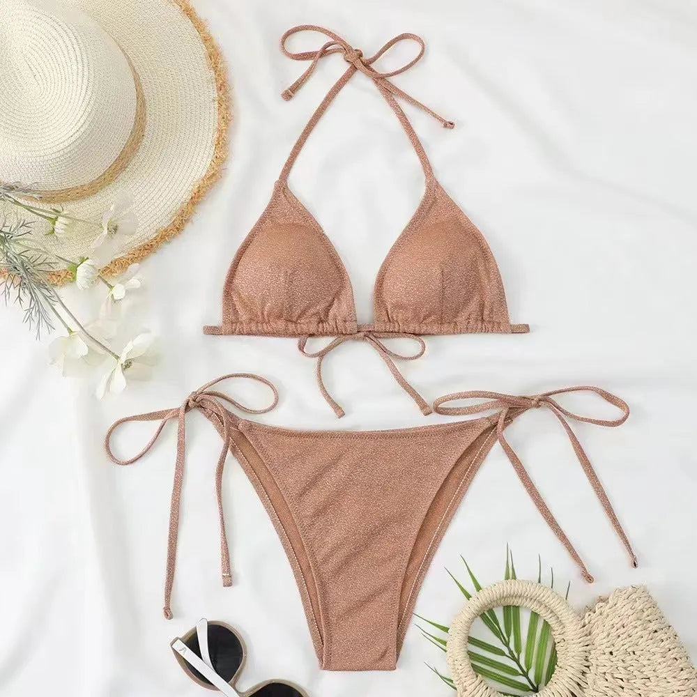 Women's split bandage style bikini swimsuit with halterneck top and briefs bottom in multiple colour options