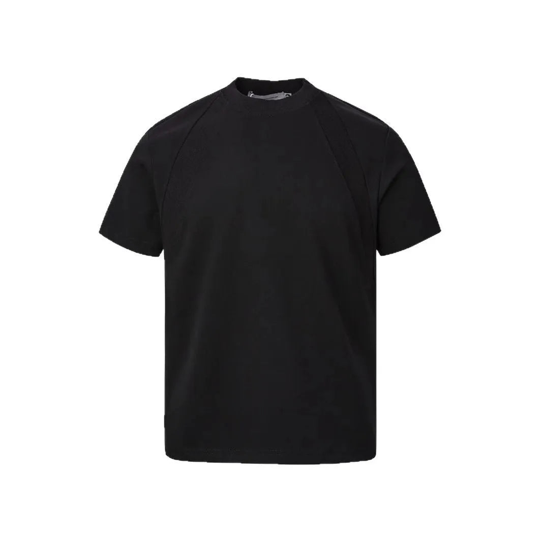 Loose short sleeve top with textured air layer stitching in black, grey, or white.