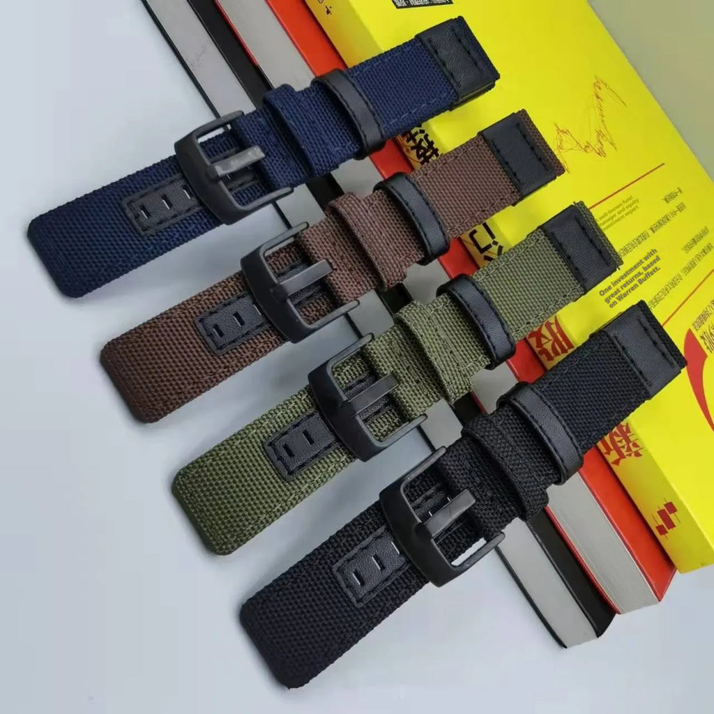 Oxford cloth canvas watch strap with quick-release bars shown in camouflage colour.