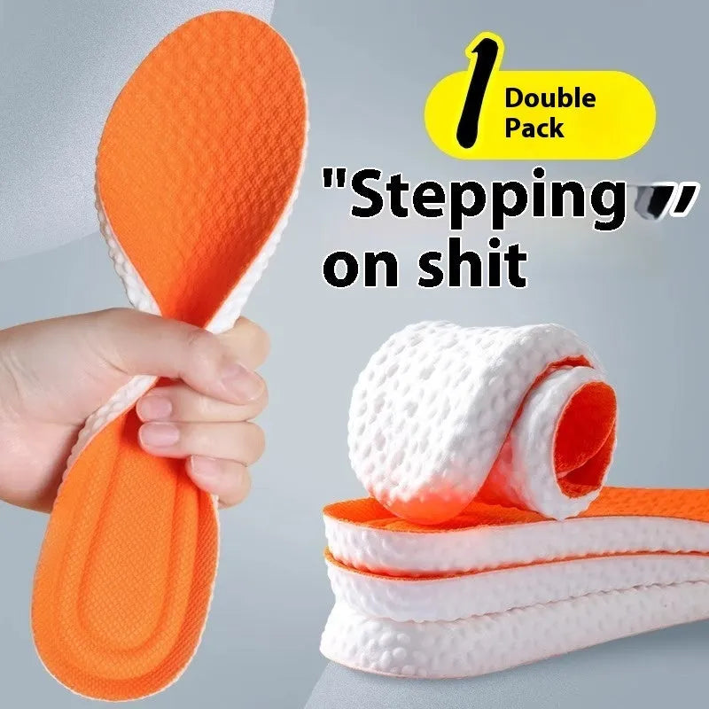 Pair of grey PU foam sports insoles on a white background, showing trimmable edges.