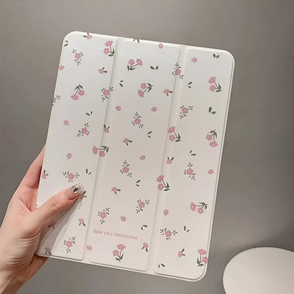 Transparent floral tri-fold tablet protective case with magnetic stand for iPad on white background
