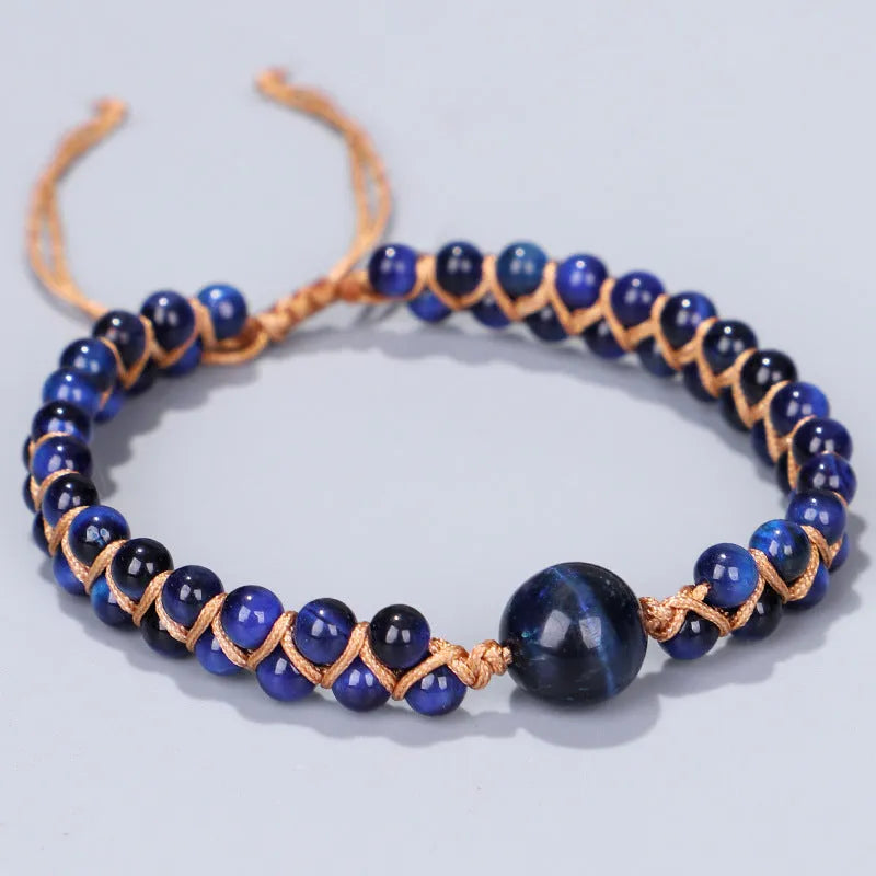 Handwoven geometric pull bracelet with blue tigereye stone beads on elastic band