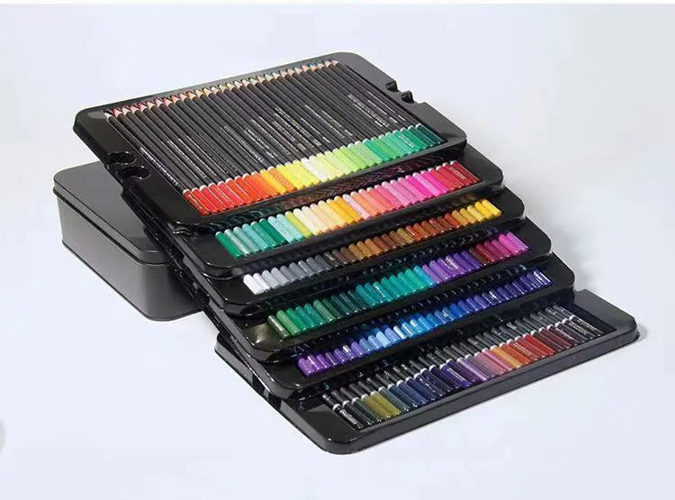 Tin box open to show 180 wooden oily painting pencils in a rainbow of colours arranged in rows.
