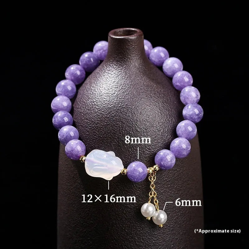 Purple aquamarine chalcedony bracelet with geometric beads and agate rabbit motif