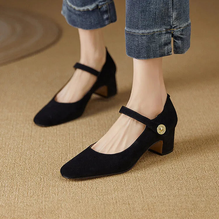 Women's black suede Mary Jane pumps with a square toe and chunky low block heel.