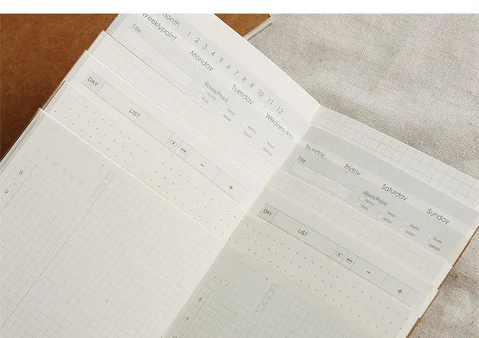 Standard size travel diary refill inner core with dots and blank ruled page options.