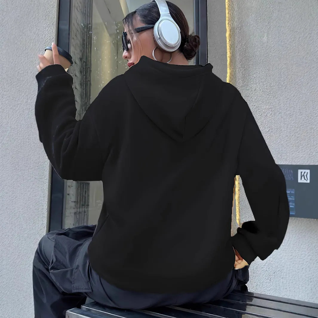 Casual long sleeved printed kangaroo pocket hoodie in black, loose fit, front view