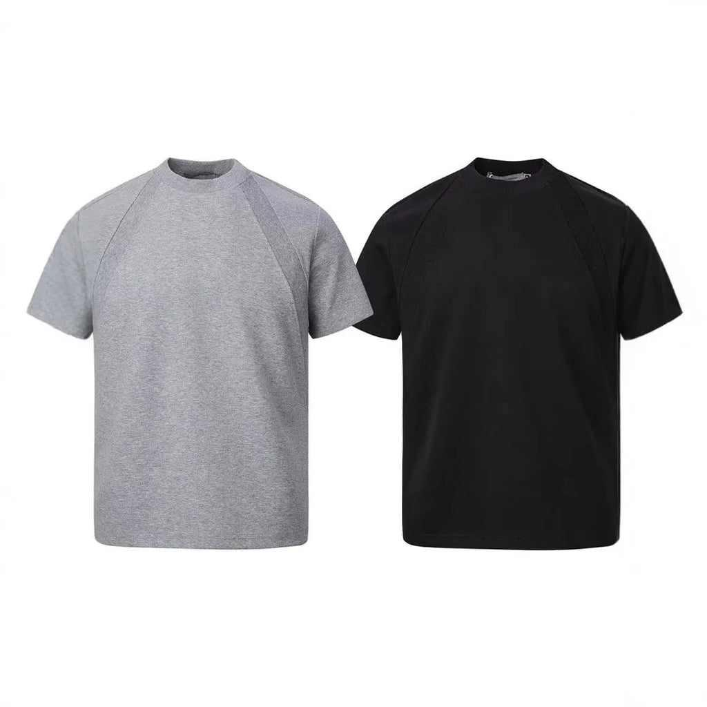Loose short sleeve top with textured air layer stitching in black, grey, or white.