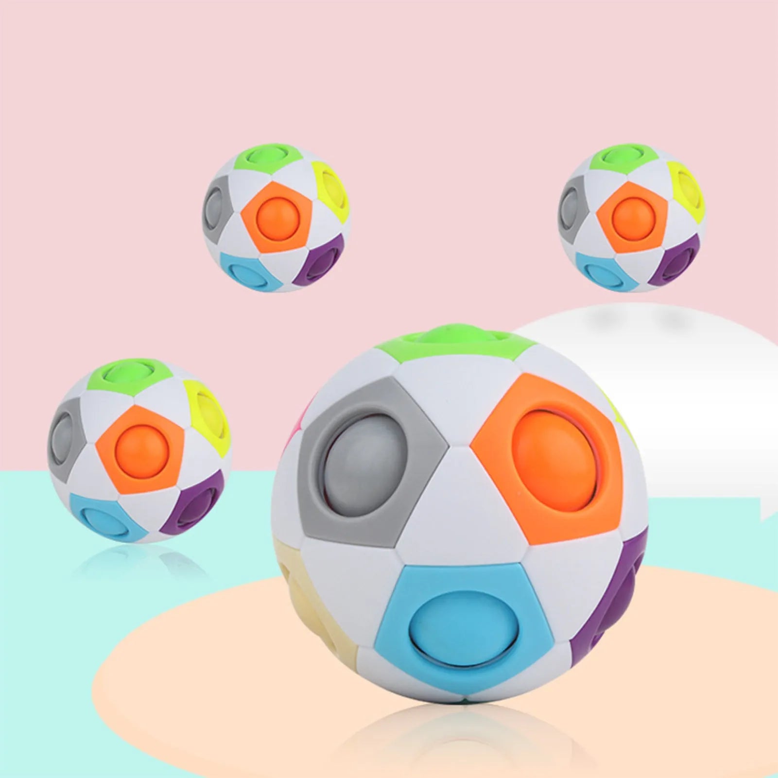 7cm diameter rainbow coloured plastic ball puzzle with visible internal coloured balls.