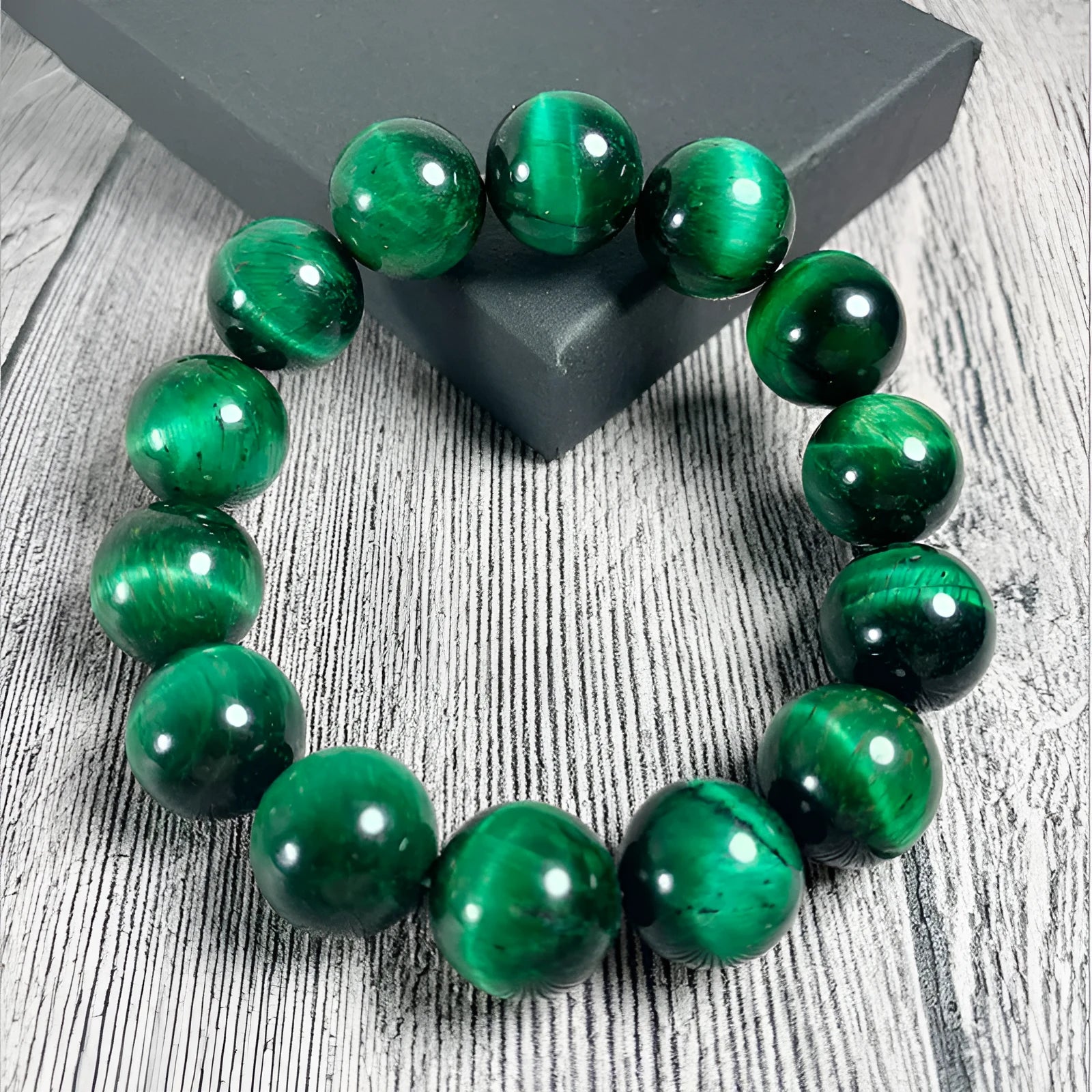 Natural green tiger eye stone bracelet with polished geometric beads in multiple sizes