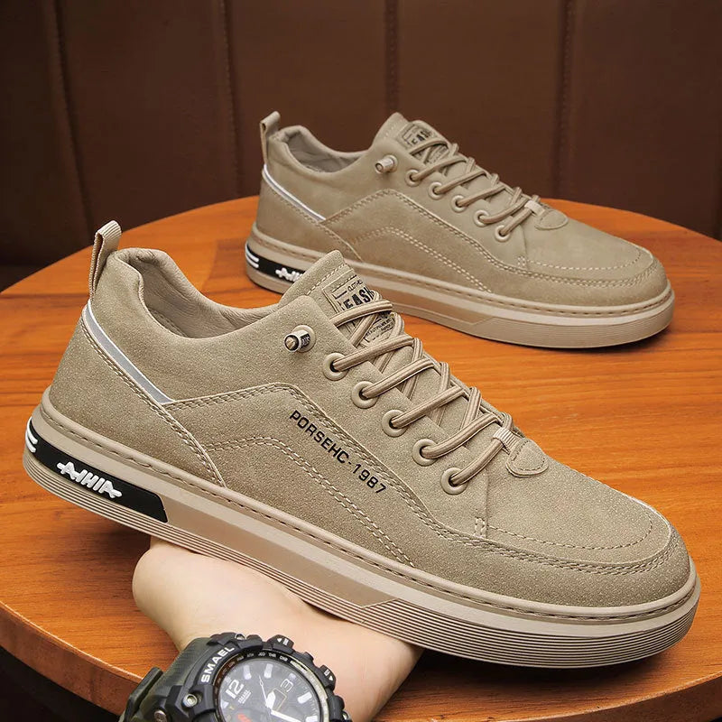 Men's khaki low-top casual work shoes with a round toe and non-slip rubber sole.