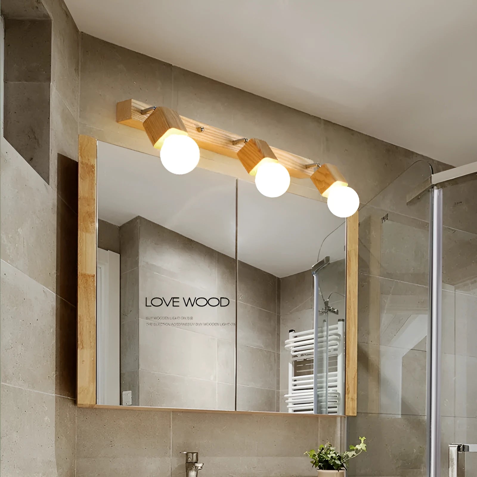 Compact 24cm LED wall lamp with a mirrored front that opens to reveal a hidden storage cabinet.