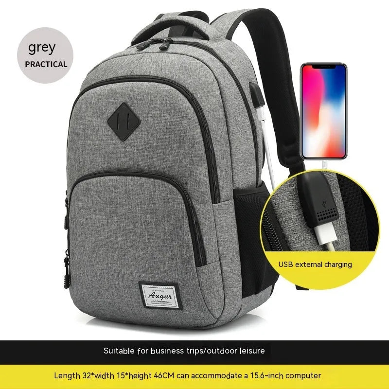 Simple lightweight backpack with USB charging interface in grey colour showing dimensions and trolley compatibility