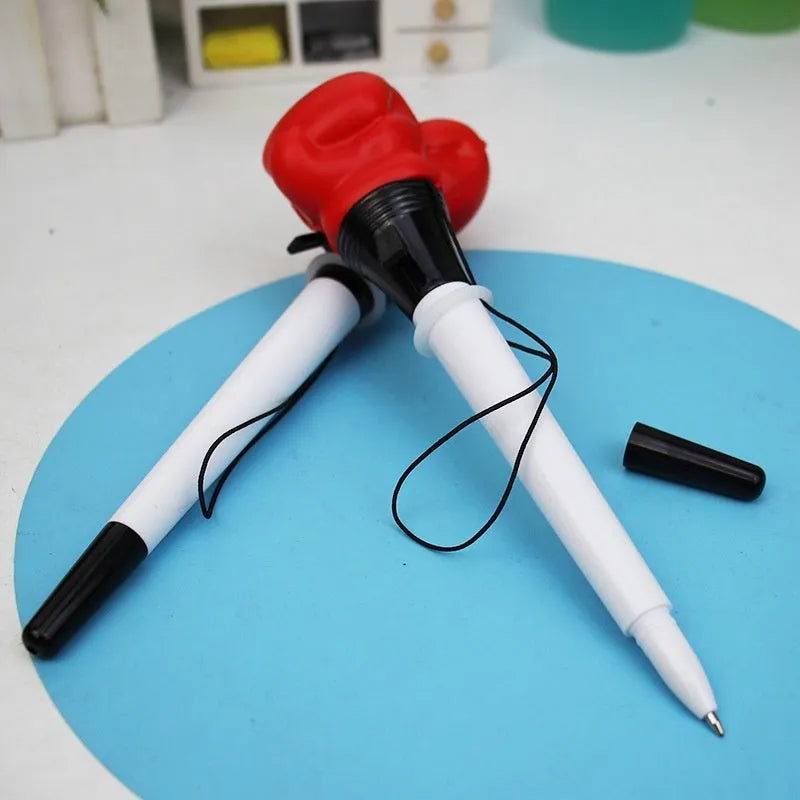 Four boxing pressure relief pens with press ejection mechanism and 0.7mm bullet tips