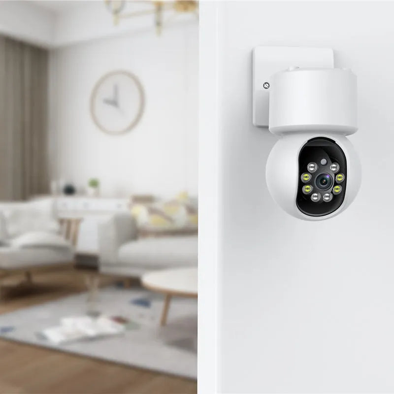 White 360-degree rotating indoor WiFi smart camera on a stand.