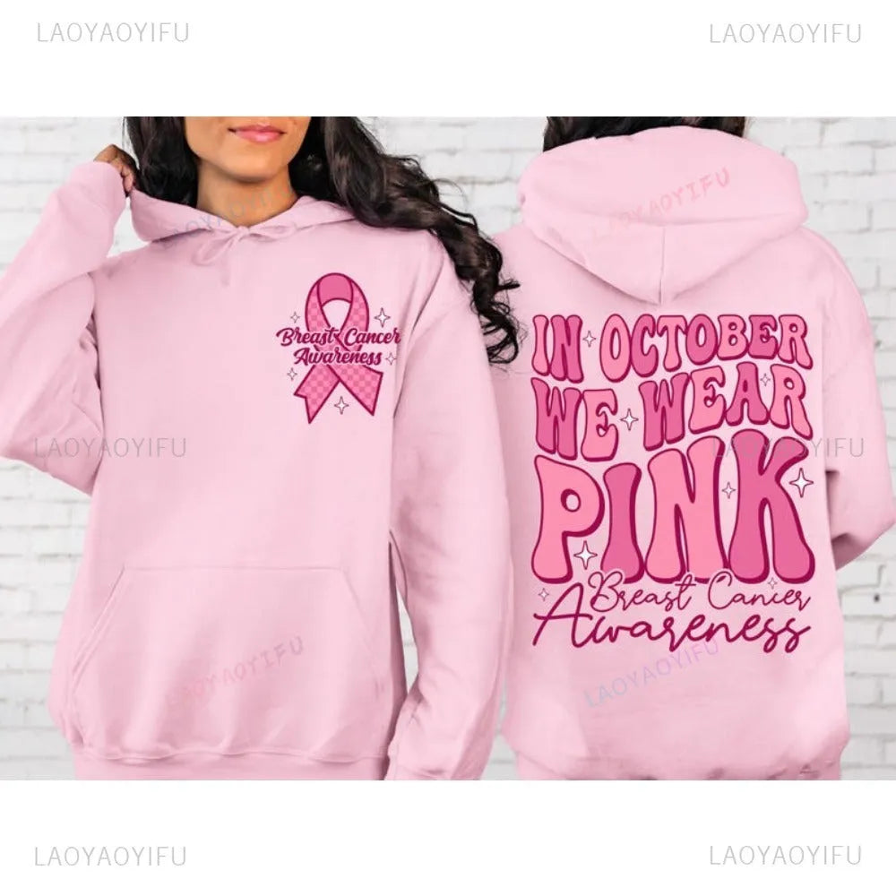 Breast Cancer Awareness pullover hoodie with retro print and side seam pockets in pink.