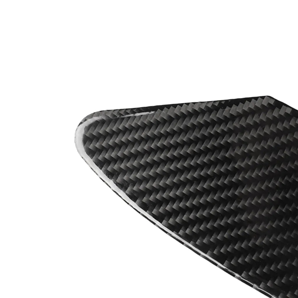 Carbon fibre USB charging port decorative sticker with 3M adhesive backing.