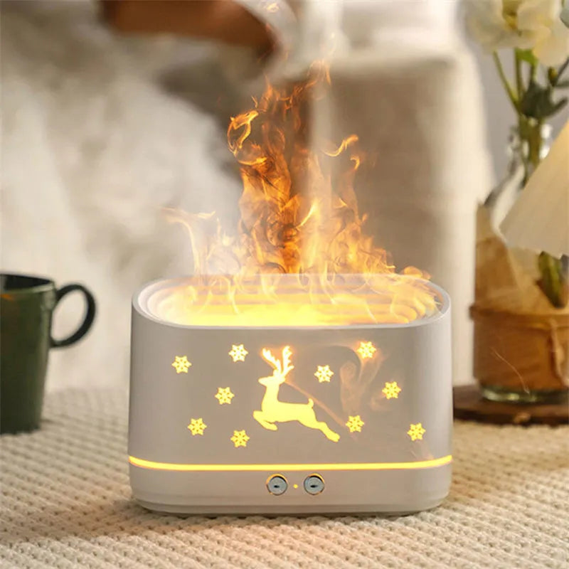 White flame effect humidifier diffuser with LED lighting and Christmas pattern, showing mist output