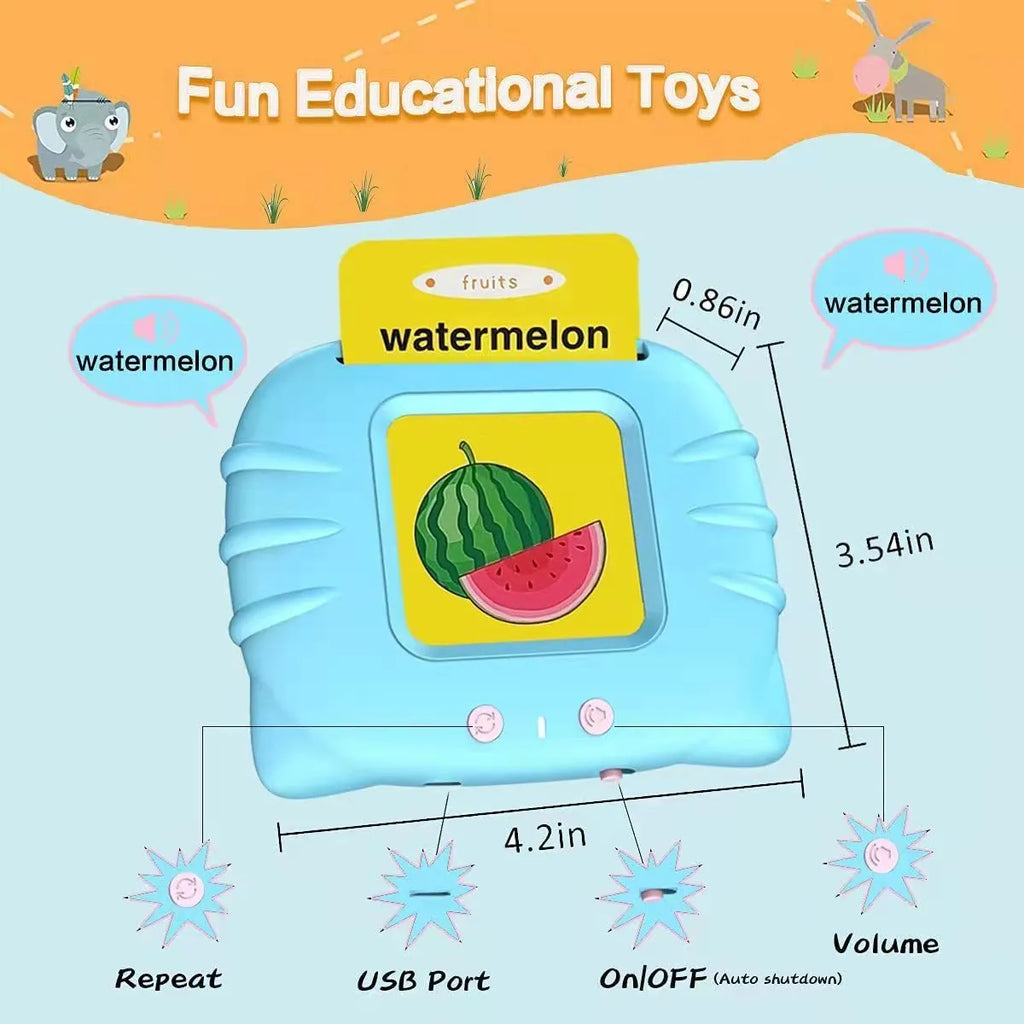 Blue children's learning machine with audio book cards on a table