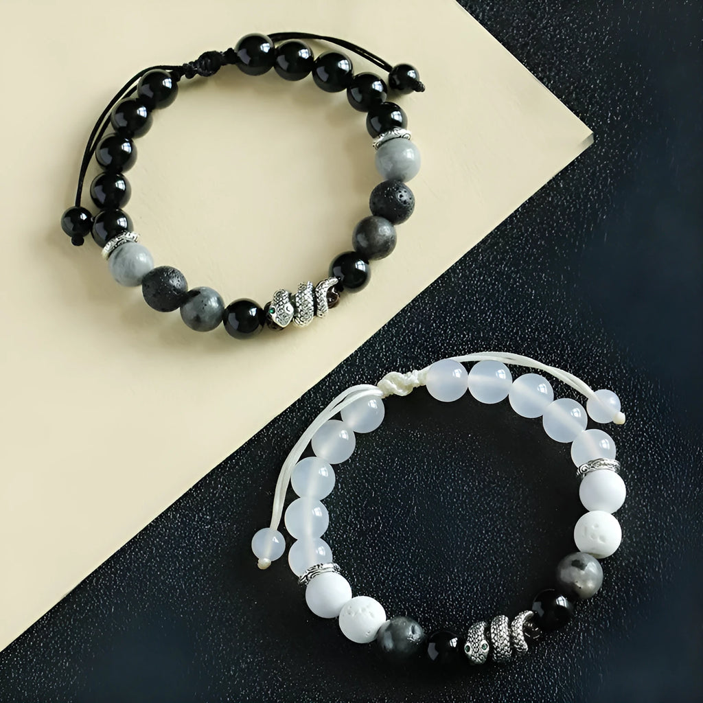 Black and white agate couple bracelets with snake clasps, turquoise accents, and glitter beads