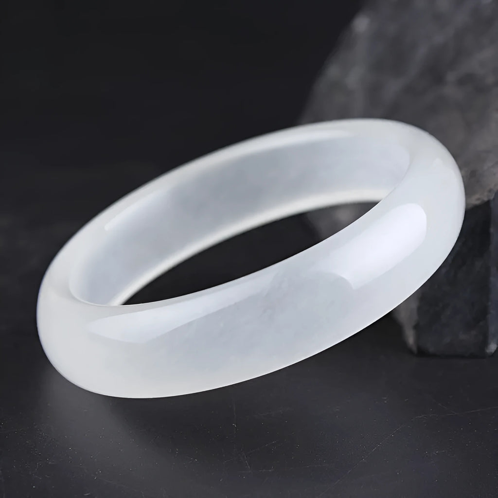 Gao Bing ice-like white moonlight jade bracelet showing flat rod and round rod style options on a wrist.