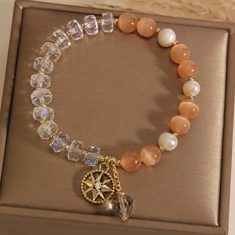Orange eight Awn star women's bracelet with gold-plated inlay setting and opal crystal accents