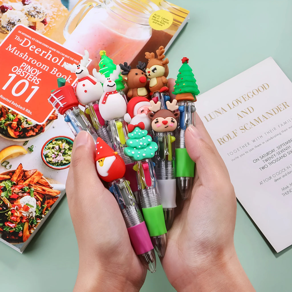 Compact red and green Christmas ballpoint pen with press button and festive designs.