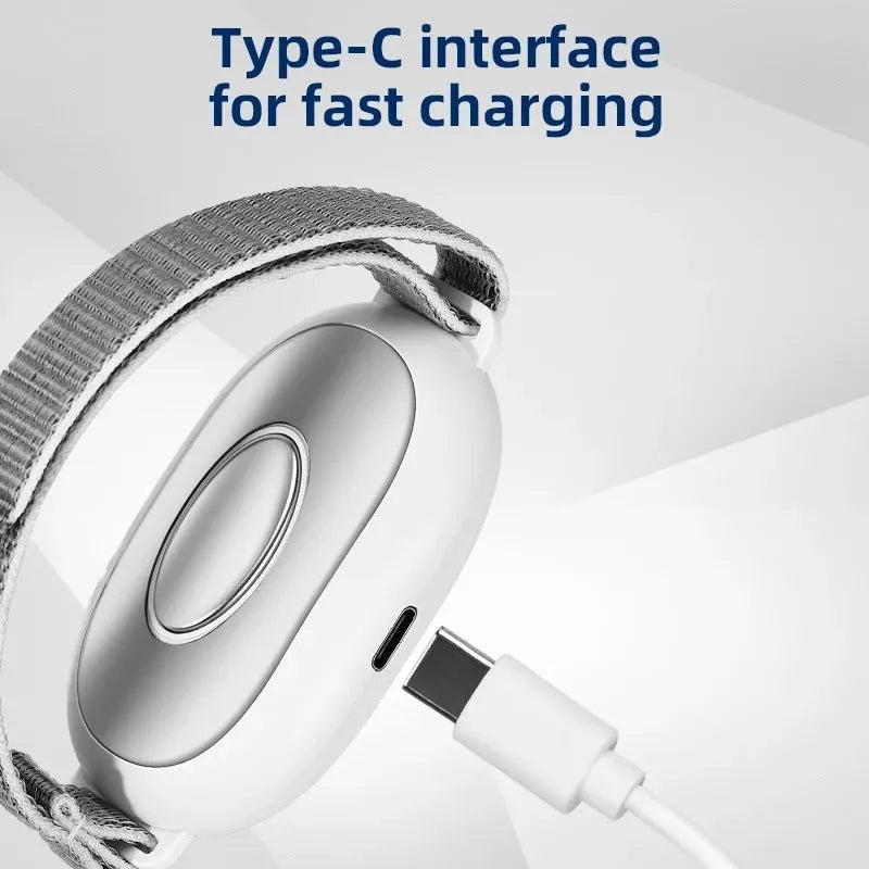 White sleep aid device with handheld remote control showing 20 intensity levels and USB charging cable