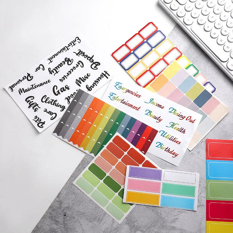 Handwritten labels and adhesive stickers showing grid configurations and colour options including white German adhesive stickers
