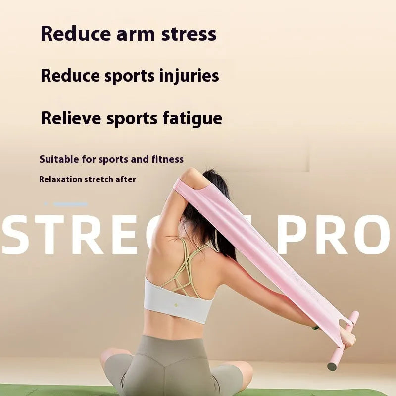 Grey and pink multi-function yoga stretching tool for shoulder, back, and hip exercises.