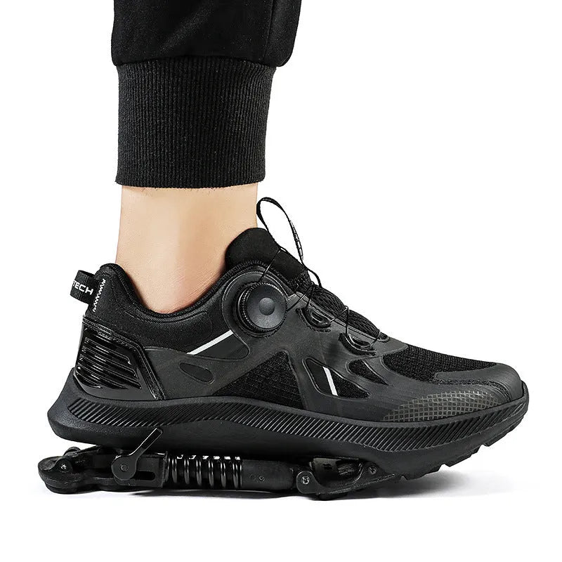 Black mid-top running shoes with mesh upper, leather stitching, and buckle closure on a rubber EVA sole.