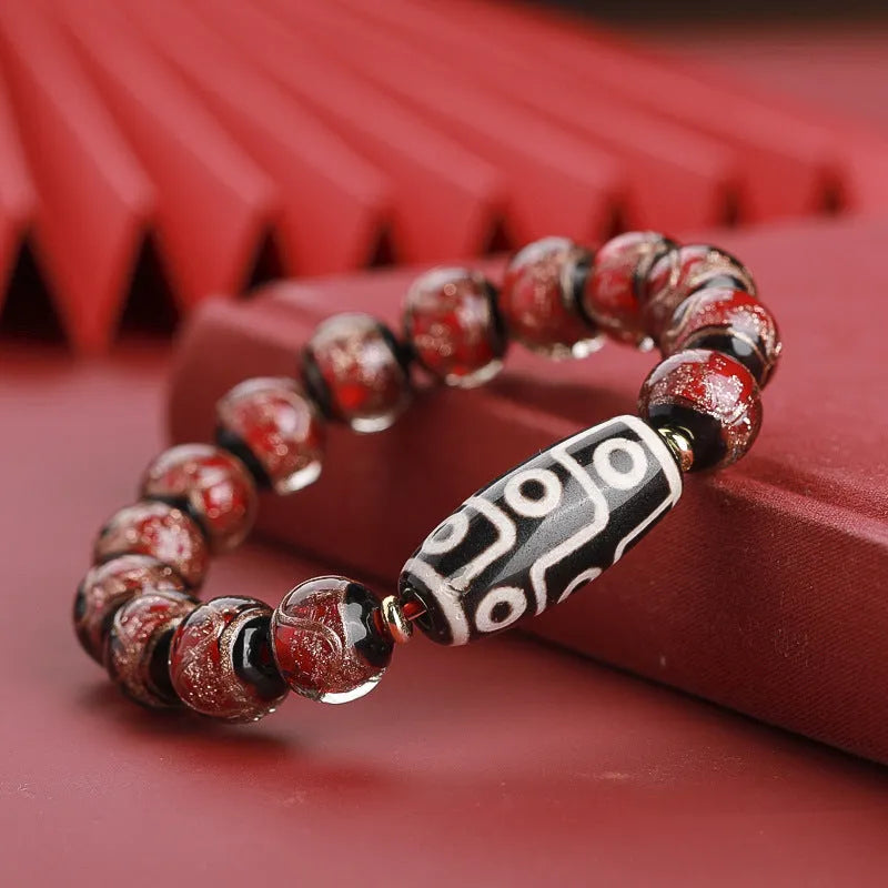 Chinese style coloured glaze bracelet with year snake lucky beads in three bead sizes