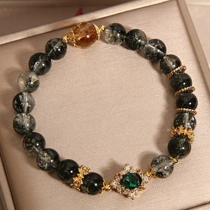Gold rutilated quartz women's bracelet with green phantom quartz, ruby quartz beads and crystal accents