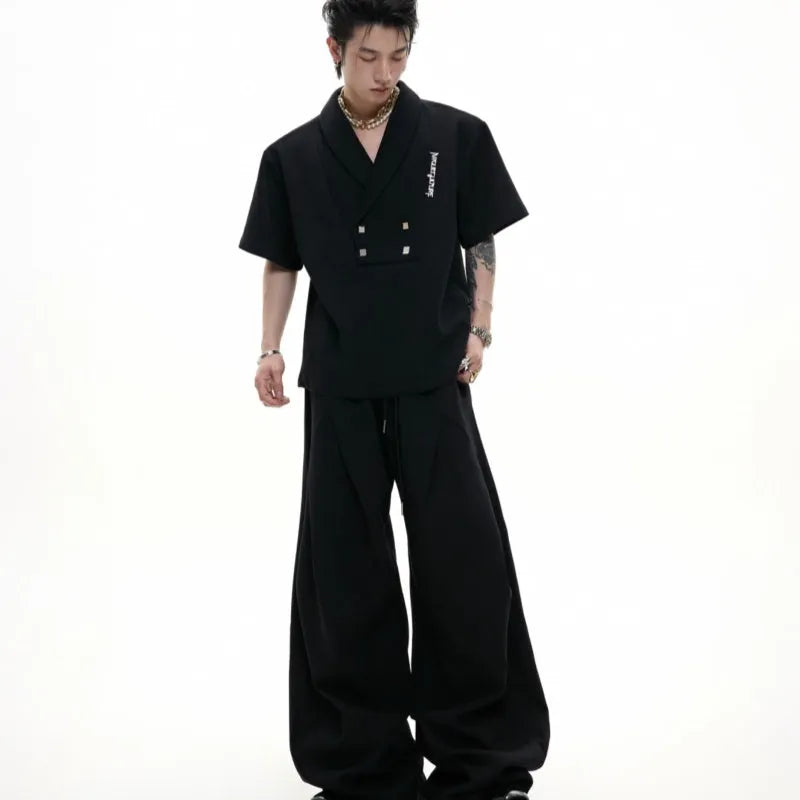 Men's dark grey V-neck padded shoulder short sleeve jacket with metal details and matching shorts