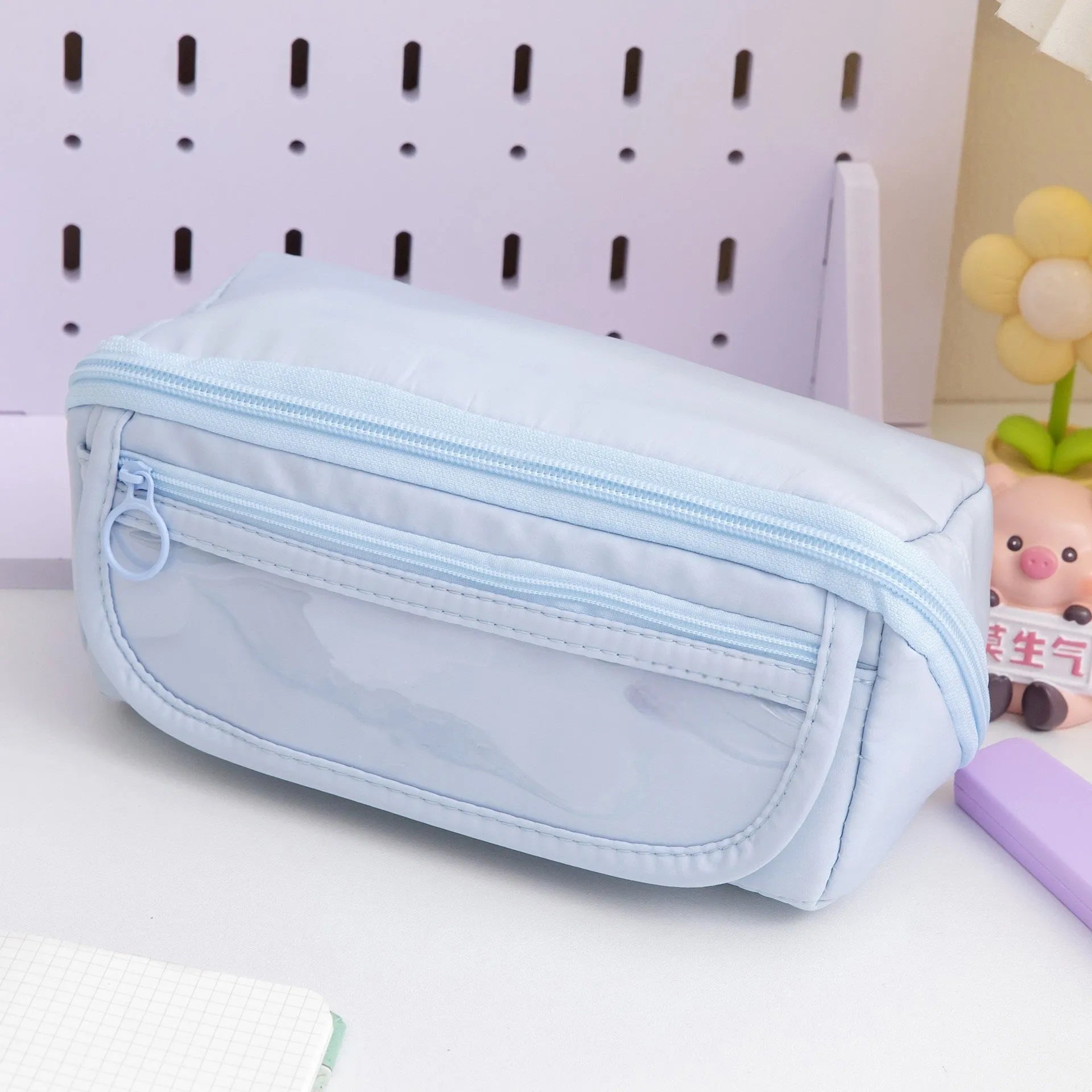 Korean style canvas pencil box with ten-layer flip design open showing multiple compartments for pens and pencils