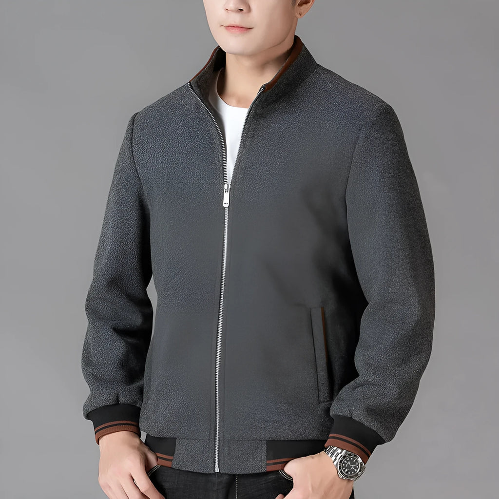 Men's grey sports-style fleece jacket with long sleeves and a stick pocket.