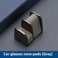 Zinc alloy and leather car dashboard glasses clip holder in green colour.