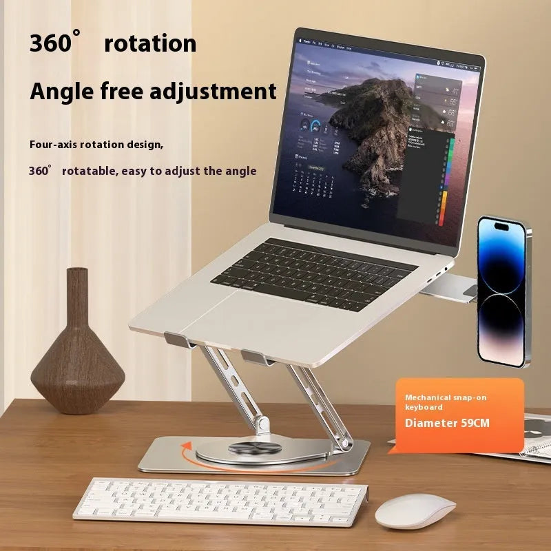 Silver carbon steel laptop stand with a rotating base and a side-mounted magnetic mobile phone holder.