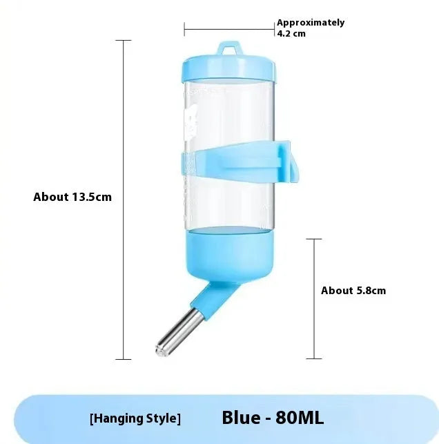 Green plastic ball kettle water feeder for small pets, shown attached to a cage.