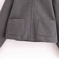 Women's grey PU short jacket with shirt collar and front zipper, regular fit with long sleeves