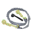 Cotton dog tug-of-war rope toy in red, shown being pulled by a dog and owner.