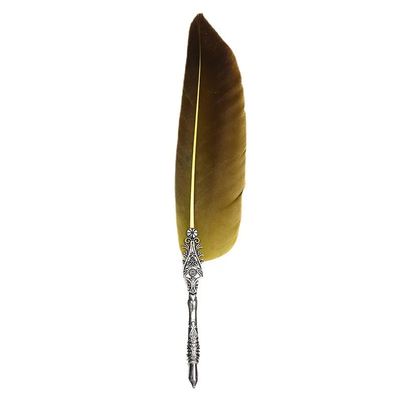 Retro zinc alloy feather dip pen in choice of ten colours on a desk.
