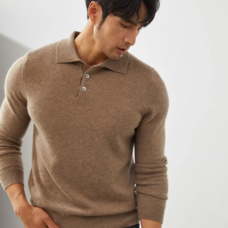 Man wearing a sapphire blue loose-fit cashmere pullover sweater with a polo collar.