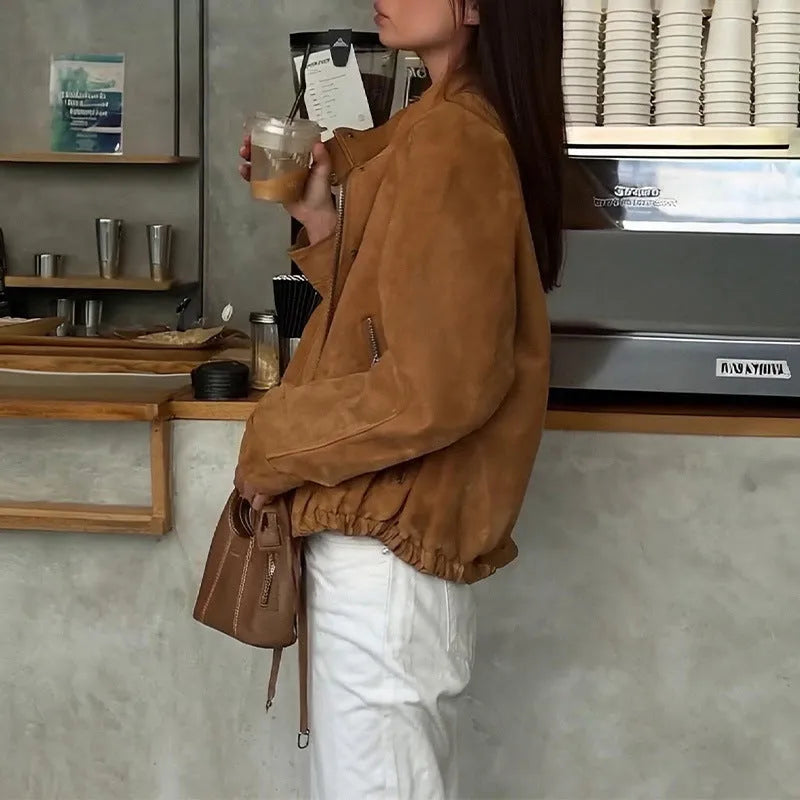 A solid colour loose-fit retro-style polyester jacket for men and women.