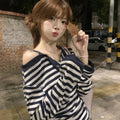 Dark blue women's long-sleeved oversized T-shirt with Korean style embroidery and stripe details.