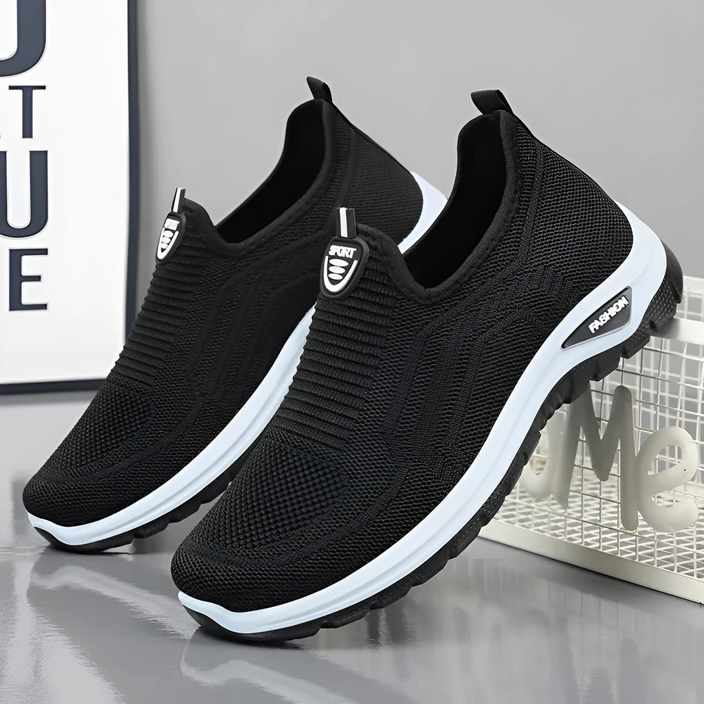 Men's black and grey breathable casual shoes with mesh lining and flat sole.