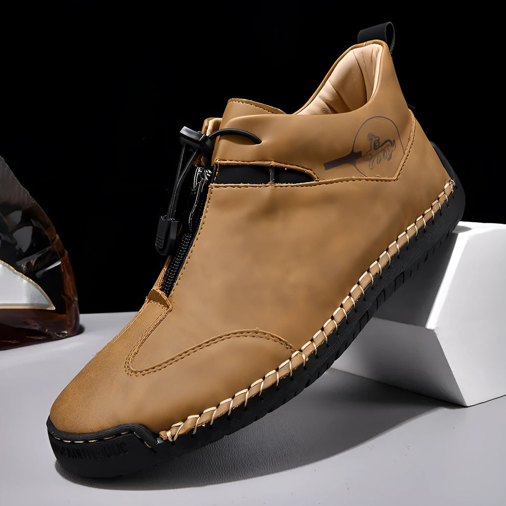 Men's black casual leather shoes with a round toe, tall crown, and a rubber sole.