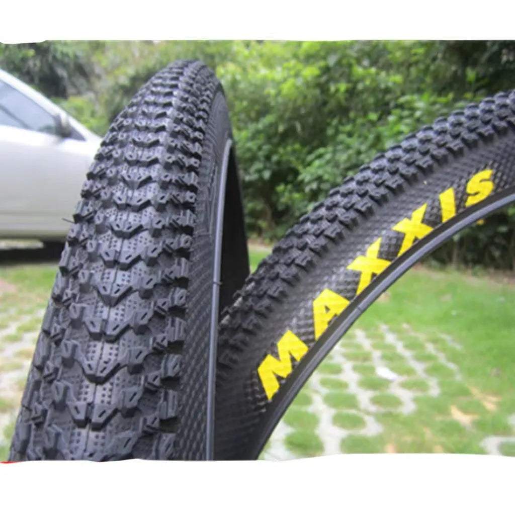 Ultralight puncture-proof mountain bike tyre showing tread pattern and sidewall in available sizes
