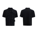 Men's black geometric print polo shirt with deconstructed collar and short sleeves, loose fit.