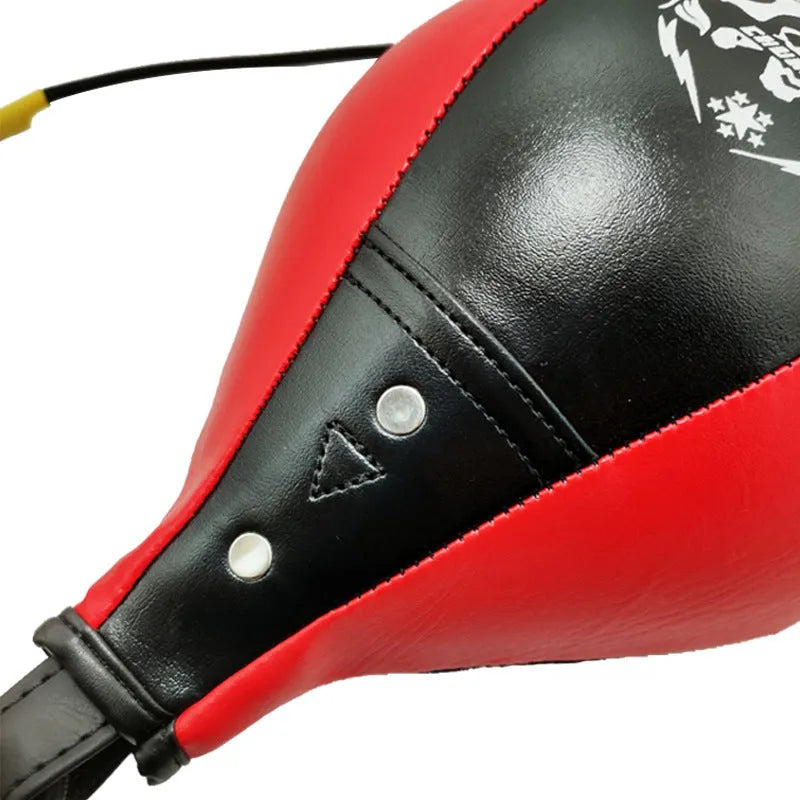 Diamond pattern boxing speed ball hanging from elastic cord in black and red colour option